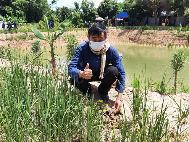 พช.นครพนม ผนึกพลัง “หิ้วปิ่นโต เอามื้อสามัคคี พลิกฟื้นแผ่นดิน กินข้าวโฮมกัน” พัฒนาศูนย์เรียนรู้ทฤษฎีใหม่ ประยุกต์สู่ โคก หนอง นา