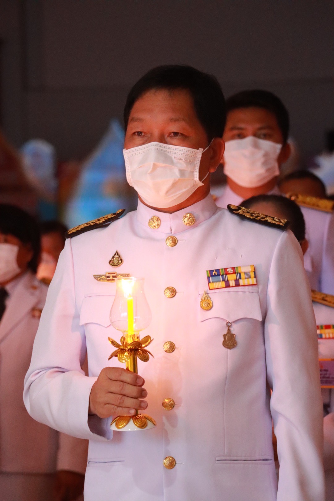 พสกนิกรจังหวัดนครพนม ประกอบพิธีจุดเทียนถวายพระพรชัยมงคลพระพันปีหลวง เนื่องในโอกาสวันเฉลิมพระชนมพรรษา 90 พรรษา