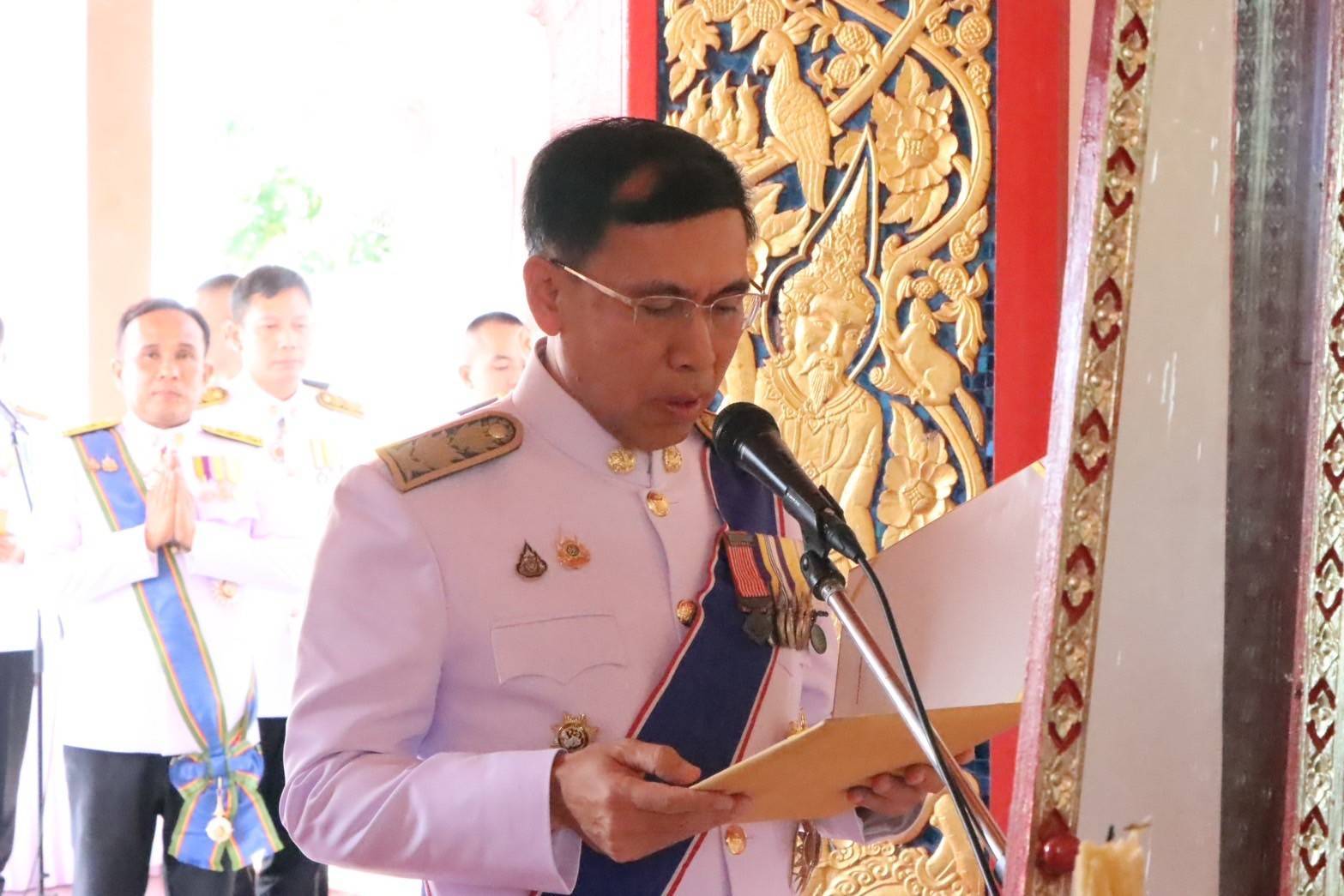 พช.นครพนม   ร่วมพิธีเวียนเทียนสมโภชน้ำพระพุทธมนต์ศักดิ์สิทธิ์